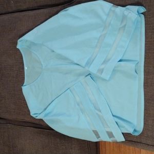 Women's 2XL blouse runs small